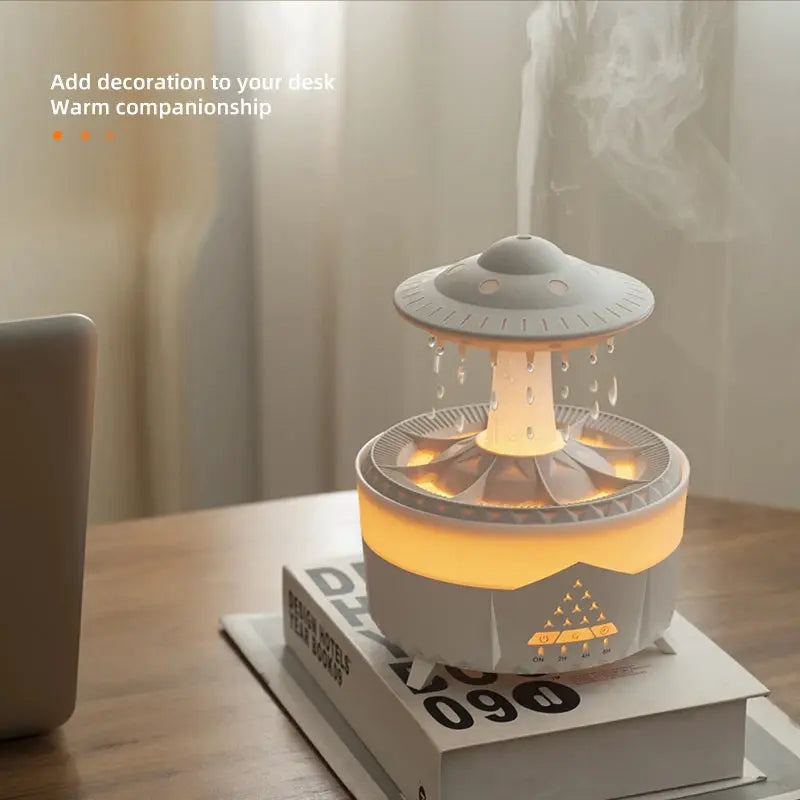 Custom and ComfortUFO Raindrop Humidifier USB Aromatherapy Air Diffuser for HomeWhy Choose the UFO Humidifier for Your Home?

Overview:
Soothe Your Mind and Body with the Sound of Rain: Our rain cloud humidifier cloud emits a gentle water drop sCustom and ComfortCustom and ComfortUFO Raindrop Humidifier